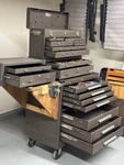 Kennedy Rolling Tool Cabinet/chest W/ Drawers, Boxes, Fold-out Shelf Brown. Fixed Price $1200.00.